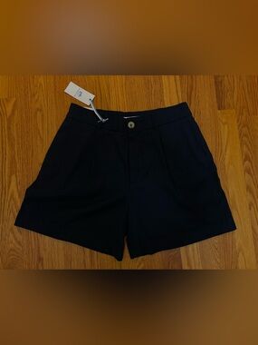 Southern Tide Navy cotton dress shorts 5” inseam.